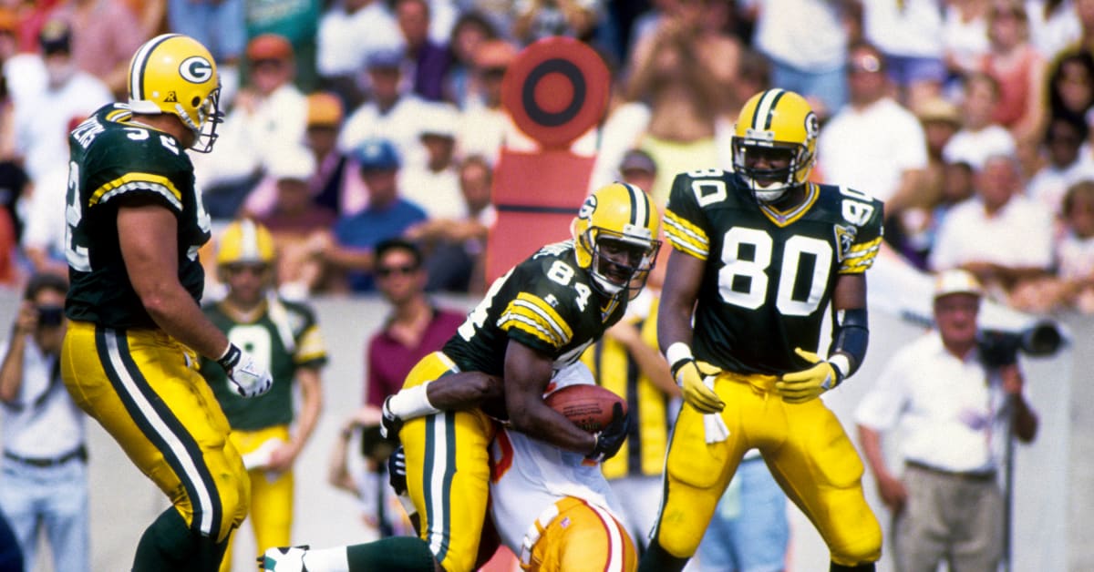 Green Bay Packers wide receiver Sterling Sharpe (84) heads for the