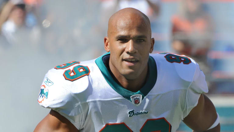 jason taylor  dolphins yes please.