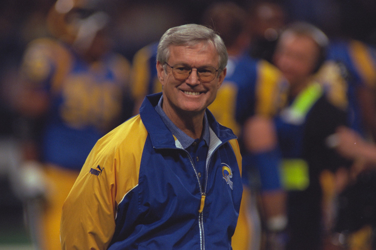 Carl Peterson presents Dick Vermeil